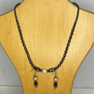 Jewelry Set Necklace and Earrings Featuring Dark Oval Beads and White Pearls.
